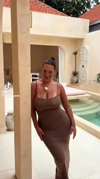 Them milkers were so astonishing that she bumped into the wall